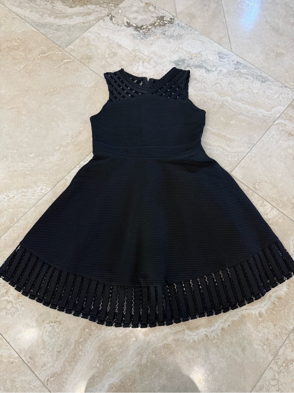 Black sleeveless skater dress with lace trim
